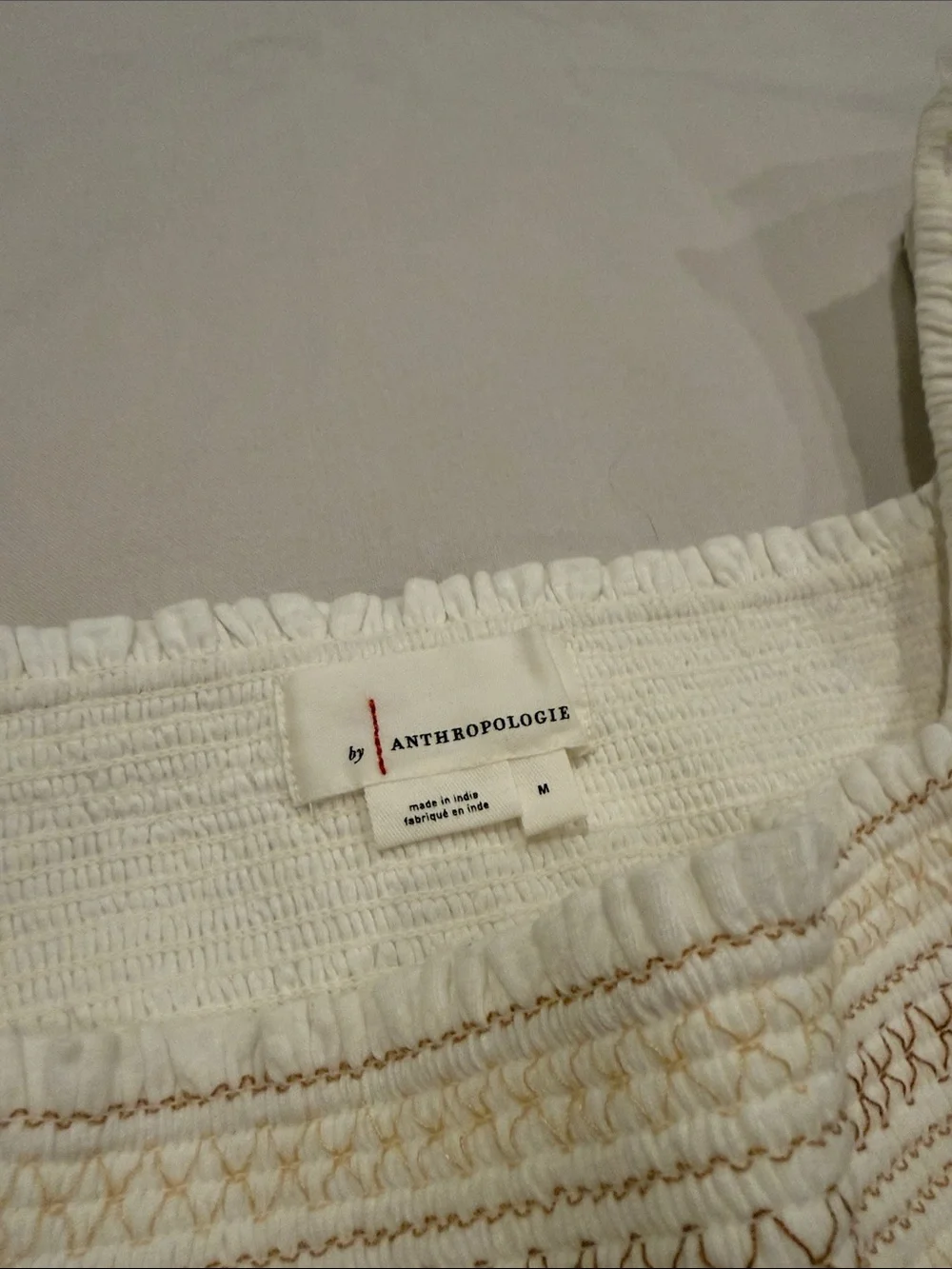 Anthropologie White Cropped Smocked Top with Mustard Floral Sleeves